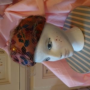 Vintage mauve satiny hat